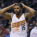  Phoenix Suns' Marcus Morris reacts to a call during the first half of an NBA basketball game against the Chicago Bulls, Tuesday, Feb. 4, 2014, in Phoenix. (AP Photo/Matt York)