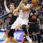  Phoenix Suns' Leandro Barbosa drives past Chicago Bulls' Mike Dunleavy during the second half of an NBA basketball game, Tuesday, Feb. 4, 2014, in Phoenix. (AP Photo/Matt York)