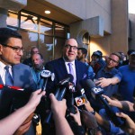               In this photo taken Wednesday, June 10, 2015, Arizona Coyotes attorney Nicholas Wood, left and team president Anthony LeBlanc, center, speak of legal action against the city of Glendale, Ariz. as they speak with the media after the city council voted to back out of an arena leasae agreement with the NHL team during a special council meeting. (David Kadlubowski/The Arizona Republic via AP)  MARICOPA COUNTY OUT; MAGS OUT; NO SALES; MANDATORY CREDIT
            