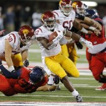 Southern California running back Javorius Allen (37) scores a touchdown during the first half of an NCAA college football game against Arizona, Saturday, Oct. 11, 2014, in Tucson, Ariz. (AP Photo/Rick Scuteri)