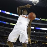 Florida's Casey Prather (24) dunks against Florida Gulf Coast during the first half of a regional semifinal game in the NCAA college basketball tournament, Friday, March 29, 2013, in Arlington, Texas. (AP Photo/David J. Phillip)