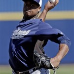 San Diego Padres' Edinson Volquez throws before an exhibition spring training baseball game against the Milwaukee Brewers Monday, Feb. 25, 2013, in Phoenix. (AP Photo/Morry Gash)