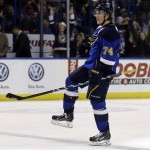 St. Louis Blues' T.J. Oshie celebrates after scoring during the second period of an NHL hockey game against the Phoenix Coyotes on Tuesday, Jan. 14, 2014, in St. Louis. The goal was Oshie's second of the game. (AP Photo/Jeff Roberson)