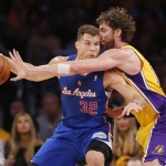  Los Angeles Clippers' Blake Griffin, left, controls the ball as Los Angeles Lakers Pau Gasol, of Spain, defends during the first half of an NBA basketball game in Los Angeles, Tuesday, Oct. 29, 2013. (AP Photo/Danny Moloshok)