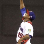The Dominican Republic's Pedro Strop (46) celebrates the last out of the seventh inning of the championship game of the World Baseball Classic against Puerto Rico in San Francisco, Tuesday, March 19, 2013. (AP Photo/Ben Margot)