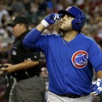 Chicago Cubs' Dioner Navarro celebrates his home run against the Arizona Diamondbacks in the second inning of a baseball game on Monday, July 22, 2013, in Phoenix. (AP Photo/Ross D. Franklin)