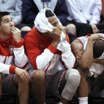 New Mexico players react on the bench as they were losing to Harvard in the second half during a second round game in the NCAA college basketball tournament in Salt Lake City Thursday, March 21, 2013. Harvard beat New Mexico 68-62. (AP Photo/George Frey)