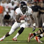 Oregon State's Storm Woods (24) makes a cut in the backfield before crossing the line of scrimmage against Arizona during the first half of an NCAA college football game at Arizona Stadium in Tucson, Ariz., Saturday, Sept. 29, 2012. (AP Photo/John Miller)