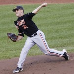 Oregon State starting pitcher Tyler Smith works against Indiana in the first inning of an NCAA College World Series elimination baseball game in Omaha, Neb., Wednesday, June 19, 2013. (AP Photo/Nati Harnik)