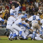 UCLA players celebrate deafeating Mississippi State 8-0 to win the championship in Game 2 of the NCAA College World Series baseball finals, Tuesday, June 25, 2013, in Omaha, Neb. (AP Photo/Ted Kirk)