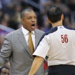 Phoenix Suns coach Alvin Gentry, left, argues a foul call on his team with referee Mark Ayotte in the first half of an NBA basketball game against the Los Angeles Clippers in Los Angeles, Saturday, Dec. 8, 2012. (AP Photo/Jae C. Hong)
