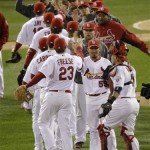 The St. Louis Cardinals celebrate after Game 4 of baseball's National League championship series against the San Francisco Giants Thursday, Oct. 18, 2012, in St. Louis. The Cardinals won 8-3 to take a 3-1 lead in the series. (AP Photo/Mark Humphrey)