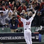 Boston Red Sox's Shane Victorino (18) celebrates his grand slam in front of fans in the seventh inning during Game 6 of the American League baseball championship series against the Detroit Tigers on Saturday, Oct. 19, 2013, in Boston.(AP Photo/Charlie Riedel)