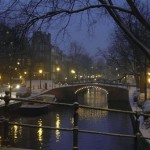 Light snow covers Reguliers canal in the city center of Amsterdam, Netherlands, Monday, Nov. 29, 2010. Winter has struck in most parts of Europe causing delays in travels, The Netherlands have not yet been affected seriously. (AP Photo/Peter Dejong)