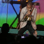 Trombone Shorty performs during the NBA All Star basketball game, Sunday, Feb. 16, 2014, in New Orleans. (AP Photo/Gerald Herbert)
