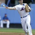 New York Mets third baseman David Wright throws to first during the fifth inning of an exhibition spring training baseball game against the St. Louis Cardinals, Wednesday, Feb. 27, 2013, in Port St. Lucie, Fla. (AP Photo/Julio Cortez)