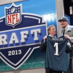Lane Johnson, from Oklahoma, stands with NFL Commissioner Roger Goodell after being selected fourth overall by the Philadelphia Eagles in the first round of the NFL football draft, Thursday, April 25, 2013, at Radio City Music Hall in New York. (AP Photo/Jason DeCrow)