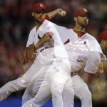 This multiple-exposure image photo shows St. Louis Cardinals starting pitcher Adam Wainwright throw during the sixth inning of Game 4 of baseball's National League championship series against the San Francisco Giants Thursday, Oct. 18, 2012, in St. Louis. (AP Photo/Jeff Roberson)