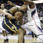 Indiana Pacers power forward David West (21) runs into Atlanta Hawks small forward Josh Smith (5) during the second half in Game 4 of their first-round NBA basketball playoff series game, Monday, April 29, 2013 in Atlanta. (AP Photo/John Bazemore)