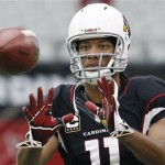 Arizona Cardinals' Larry Fitzgerald catches a pass as he warms up prior to an NFL football game against the Philadelphia Eagles, Sunday, Sept. 23, 2012, in Glendale, Ariz. (AP Photo/Ross D. Franklin)
