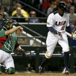 United States' Adam Jones (10) strikes out as Mexico catcher Humberto Cota, left, throws the ball back to the infield in the ninth inning during a World Baseball Classic baseball game on Friday, March 8, 2013, in Phoenix. Mexico defeated the United States 5-2. (AP Photo/Ross D. Franklin)