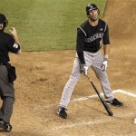 Colorado Rockies' Ryan Spilborghs, right, is called out on strikes by umpire Dana DeMuth during the sixth inning of a baseball game against the Arizona Diamondbacks on Wednesday, Sept. 22, 2010, in Phoenix. (AP Photo/Ross D. Franklin)