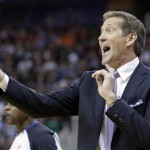  Phoenix Suns head coach Jeff Hornacek shouts to his team in the second quarter of an NBA basketball game against the Utah Jazz, Wednesday, Feb. 26, 2014, in Salt Lake City. (AP Photo/Rick Bowmer)