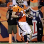 Denver Broncos wide receiver Wes Welker scores a touchdown against the Baltimore Ravens during the second half of an NFL football game, Thursday, Sept. 5, 2013, in Denver. (AP Photo/Joe Mahoney)
