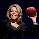 Opera singer Renee Fleming who will sing the National Anthem before the NFL Super Bowl XLVIII football game holds the game ball during a press conference Thursday, Jan. 30, 2014, in New York. (AP Photo)