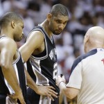 San Antonio Spurs power forward Tim Duncan (21) and San Antonio Spurs point guard Gary Neal (14) listen to official Joe Crawford (17) during the second half of Game 6 of the NBA Finals basketball game against the Miami Heat, Tuesday, June 18, 2013 in Miami. (AP Photo/Lynne Sladky)