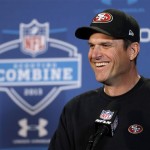 San Francisco 49ers head coach Jim Harbaugh answers a question during a news conference at the NFL football scouting combine in Indianapolis, Friday, Feb. 22, 2013. (AP Photo/Michael Conroy)