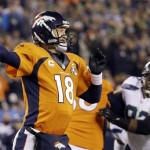 Denver Broncos' Peyton Manning throws against the Seattle Seahawks during the first half of the NFL Super Bowl XLVIII football game Sunday, Feb. 2, 2014, in East Rutherford, N.J. (AP Photo/Mark Humphrey)