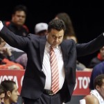  Arizona coach Sean Miller gestures to his team against San Diego State during the first half of an NCAA college basketball game Thursday, Nov. 14, 2013, in San Diego. (AP Photo/Lenny Ignelzi)
