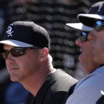 Chicago White Sox manager Robin Ventura, left, watches during an exhibition spring training baseball game against the Texas Rangers Tuesday, Feb. 26, 2013, in Surprise, Ariz. (AP Photo/Charlie Riedel)