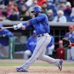 Toronto Blue Jays' Jose Bautista follows through after hitting a home run off Philadelphia Phillies' Aaron Cook during the third inning of a spring training exhibition baseball game on Sunday, March 3, 2013, in Clearwater, Fla. Philadelphia won 13-5. (AP Photo/Matt Slocum)