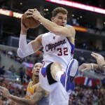 Los Angeles Clippers' Blake Griffin gets a rebound in the first half of an NBA basketball game against the Phoenix Suns in Los Angeles, Saturday, Dec. 8, 2012. (AP Photo/Jae C. Hong)
