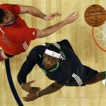 West Team's Kevin Love, of the Minnesota Timberwolves (42) defends against East Team's LeBron James, of the Miami Heat (6) during the NBA All Star basketball game, Sunday, Feb. 16, 2014, in New Orleans. (AP Photo/Gerald Herbert)
