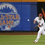National League's Bryce Harper, of the Washington Nationals, catches a fly ball to center field during the first inning of the MLB All-Star baseball game, on Tuesday, July 16, 2013, in New York. (AP Photo/Matt Slocum)