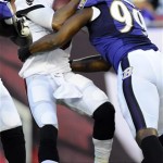 Tampa Bay Buccaneers quarterback Josh Freeman (5) is sacked by Baltimore Ravens defensive tackle Chris Canty (99) during the first quarter of an NFL preseason football game Thursday, Aug. 8, 2013, in Tampa, Fla. (AP Photo/Brian Blanco)