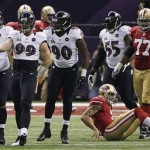 Baltimore Ravens linebacker Paul Kruger (99) reacts after sacking San Francisco 49ers quarterback Colin Kaepernick (7) during the first half of the NFL Super Bowl XLVII football game, Sunday, Feb. 3, 2013, in New Orleans. (AP Photo/Bill Haber)