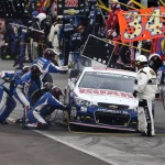 Dale Earnhart Jr., makes a pit stop during the NASCAR Sprint Cup Series auto race, Sunday, March 3, 2013, in Avondale, Ariz. (AP Photo/Matt York)