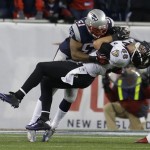 Baltimore Ravens tight end Dennis Pitta (88) is tackled by New England Patriots outside linebacker Jerod Mayo (51) during the second half of the NFL football AFC Championship football game in Foxborough, Mass., Sunday, Jan. 20, 2013. (AP Photo/Elise Amendola)
