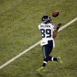 Seattle Seahawks' Doug Baldwin (89) makes a catch during the first half of the NFL Super Bowl XLVIII football game against the Denver Broncos Sunday, Feb. 2, 2014, in East Rutherford, N.J. (AP Photo/Charlie Riedel)