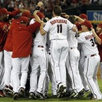 Arizona Diamondbacks players celebrate after 
the ninth inning in an MLB baseball game 
against the San Francisco Giants Friday, Sept. 
23, 2011, in Phoenix. The Diamondbacks defeated 
the Giants 3-1 and won the 2011 National League 
West Champions title. (AP Photo/Ross D. 
Franklin)