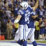 Indianapolis Colts quarterback Andrew Luck (12) celebrates after scoring a touchdown against the Kansas City Chiefs during the second half of an NFL wild-card playoff football game Saturday, Jan. 4, 2014, in Indianapolis. (AP Photo/Michael Conroy)
