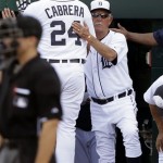 Detroit Tigers manager Jim Leyland, right, greets third baseman Miguel Cabrera (24) after his home run during the third inning of an exhibition spring training baseball game against the Toronto Blue Jays, Saturday, Feb. 23, 2013, in Lakeland, Fla. (AP Photo/Charlie Neibergall)
