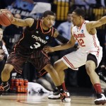 Cincinnati guard Dion Dixon (3) drives against Ohio State guard Lenzelle Smith, Jr. (32) in the first half of an East Regional semifinal game in the NCAA men's college basketball tournament, Thursday, March 22, 2012, in Boston. (AP Photo/Michael Dwyer)