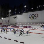 Athletes compete during the women's biathlon 12.5k mass-start at the 2014 Winter Olympics, Monday, Feb. 17, 2014, in Krasnaya Polyana, Russia. (AP Photo/Kirsty Wigglesworth)