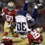  San Diego Chargers running back Ronnie Brown (30) flips over San Francisco 49ers cornerback Chris Culliver (29) during the first half of an NFL preseason football game in San Francisco, Thursday, Aug. 30, 2012. (AP Photo/Marcio Jose Sanchez)