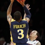  Drexel's Chris Fouch (3) shoots against Arizona's Gabe York during the first half of an NCAA college basketball game in the semifinals of the NIT Season Tip-off tournament Wednesday, Nov. 27, 2013, in New York. (AP Photo/Jason DeCrow)